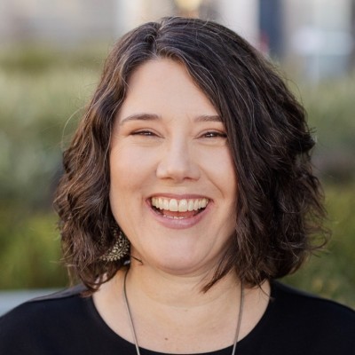 Headshot of Su Zangara smiling